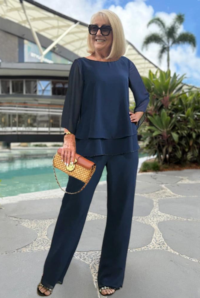 Elegant women's two-piece set by Lumina Wear featuring a relaxed fit, stylish top and matching pants in a soft, sophisticated design.