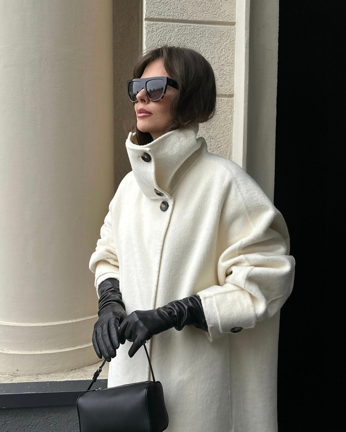 Elegant structured longline coat with high-neck design by Lumina Wear, featuring a tailored fit and sophisticated style.
