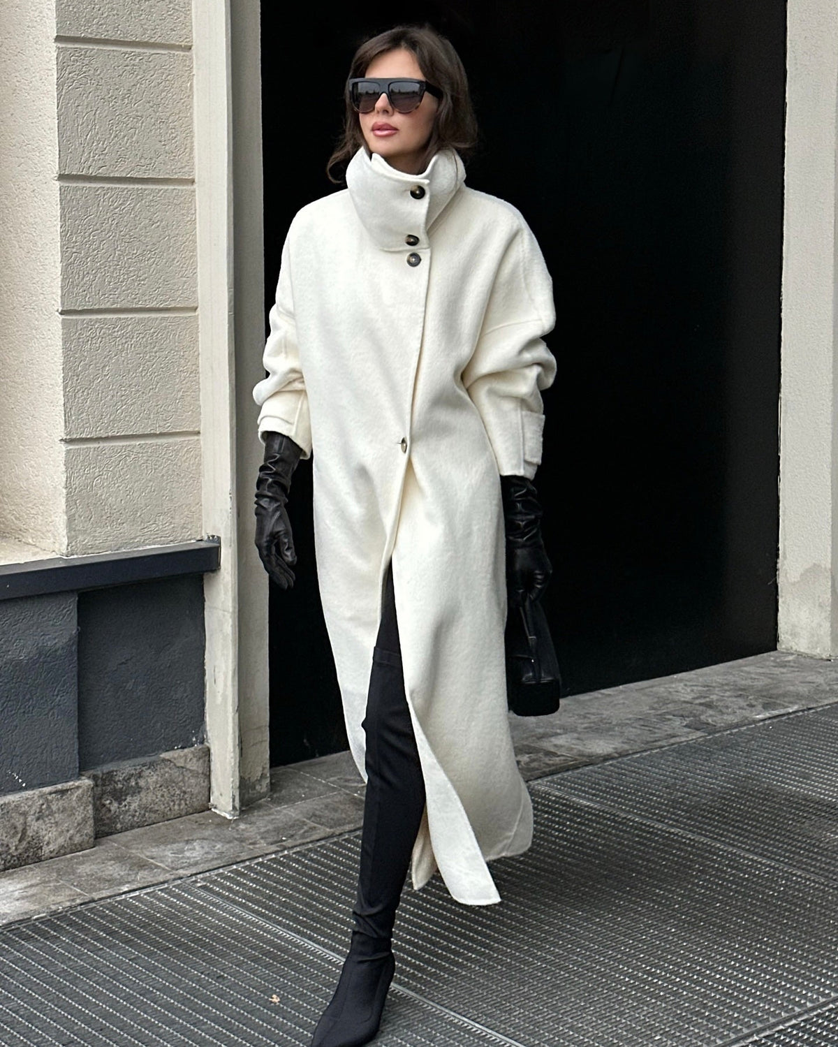 Elegant structured longline coat with high-neck design by Lumina Wear, featuring a tailored fit and sophisticated style.