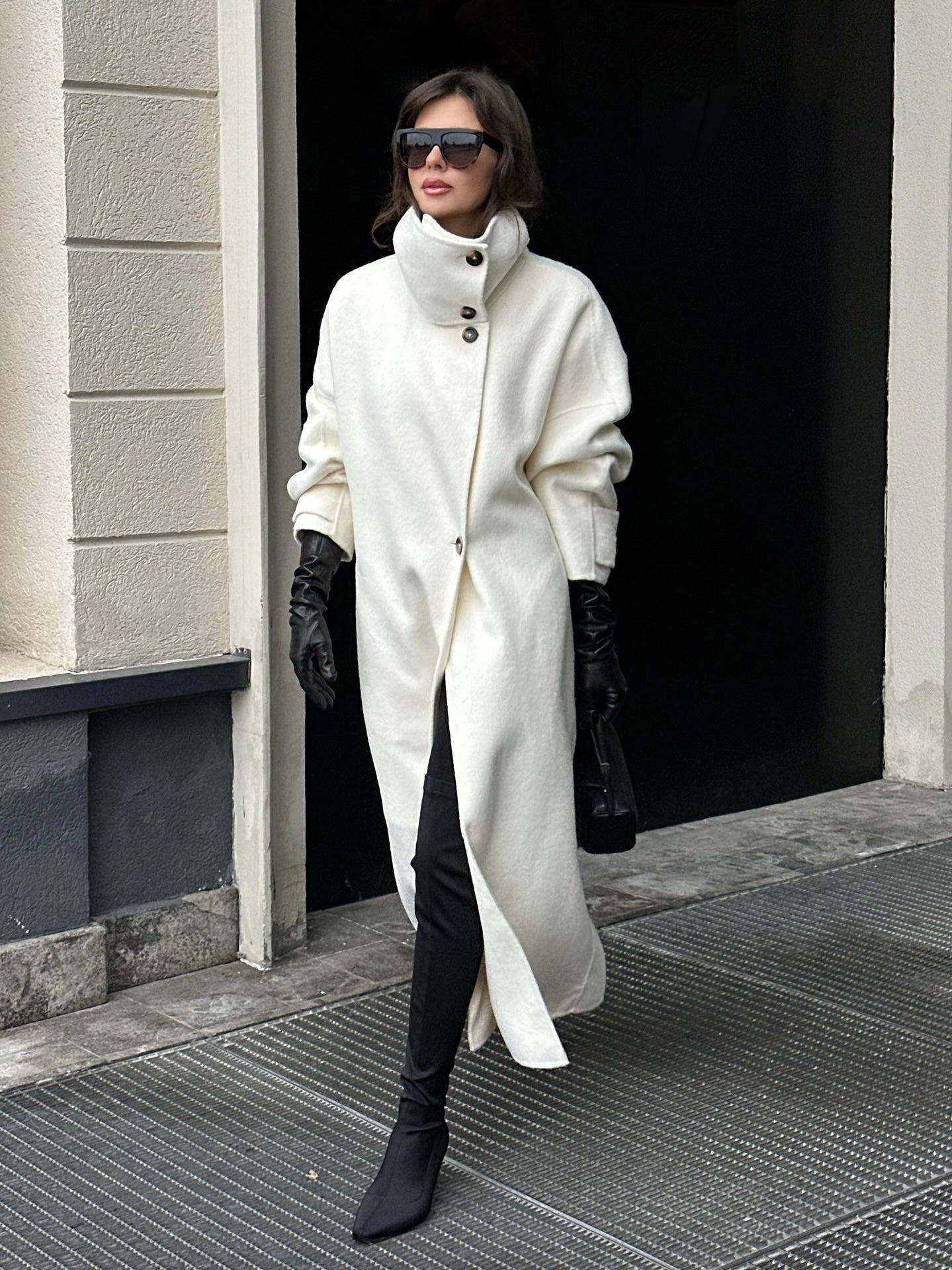 Elegant Lumina Wear Amaya longline coat with structured design and high-neck detail, stylish outerwear for sophisticated winter looks.