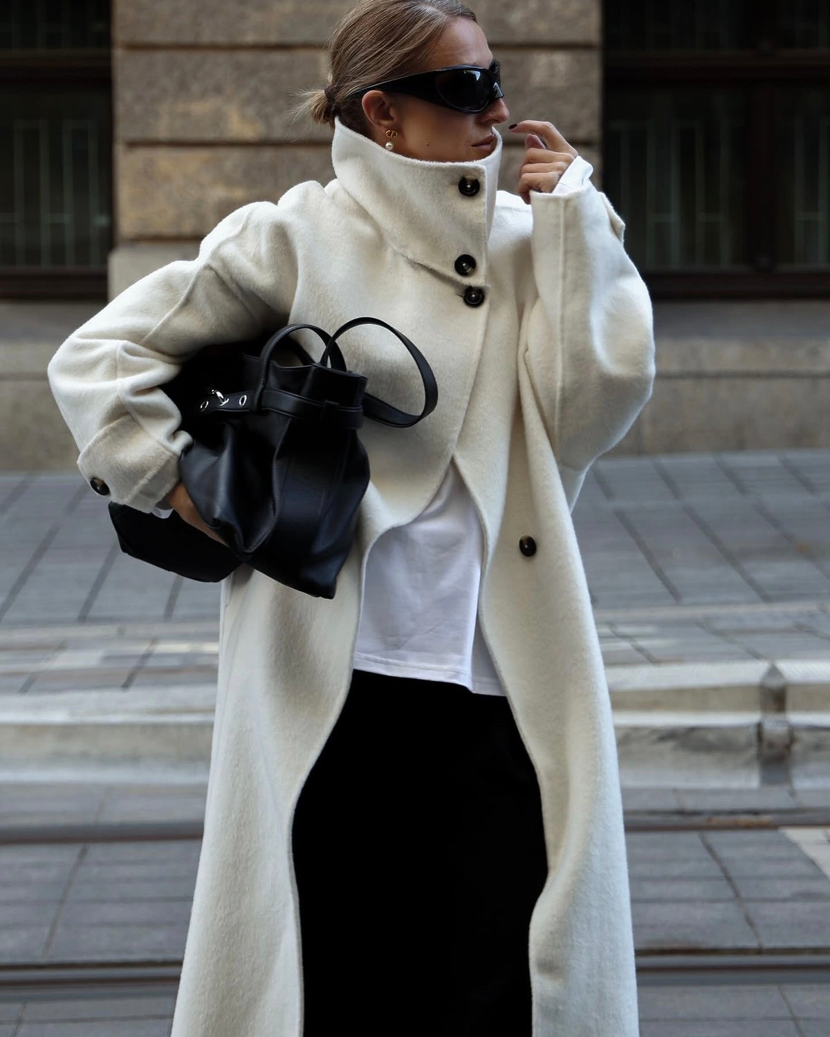 Elegant structured longline coat with high-neck design by Lumina Wear, featuring tailored fit and sophisticated style.