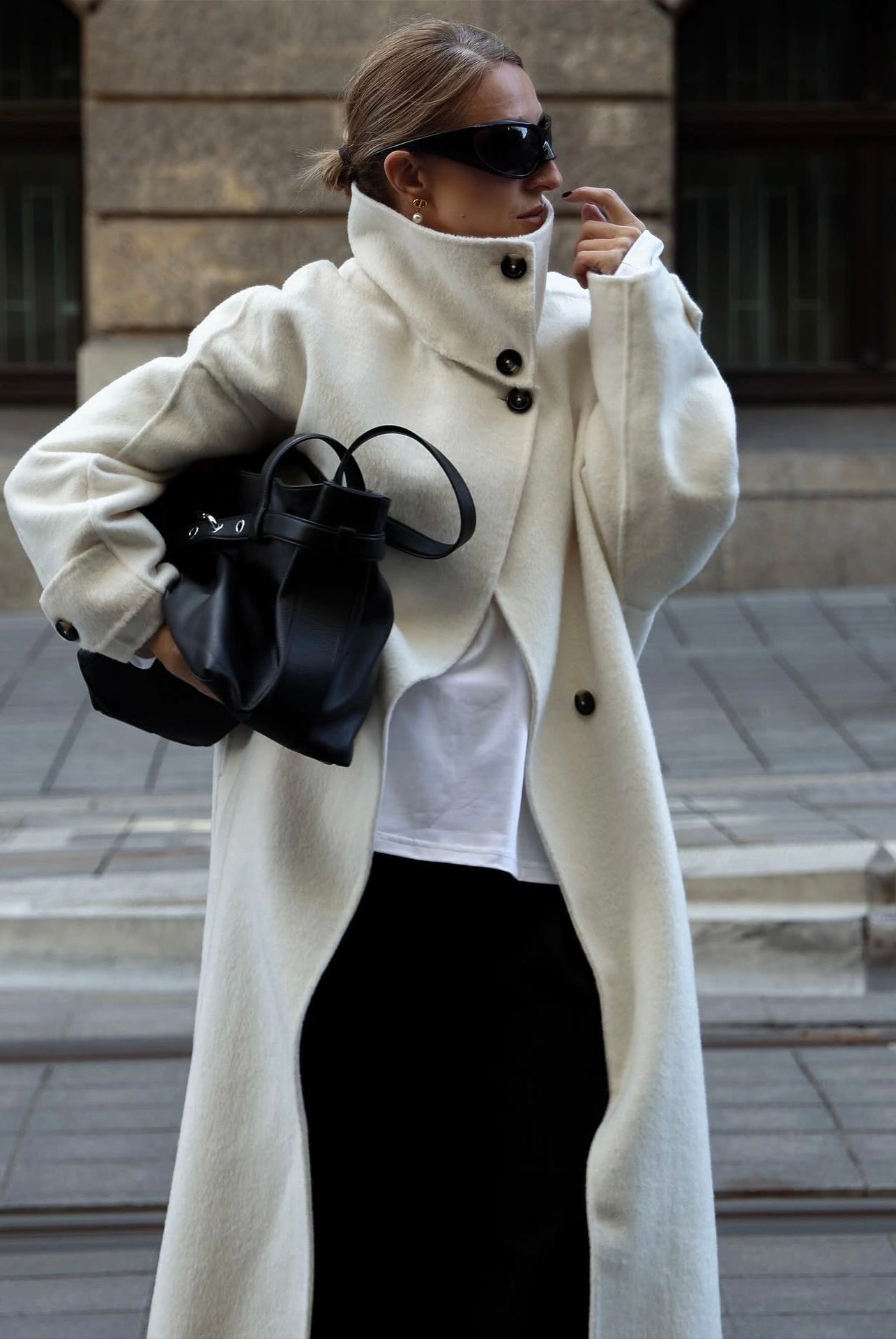 Elegant structured longline coat with high-neck design by Lumina Wear, featuring a tailored fit and sophisticated style.