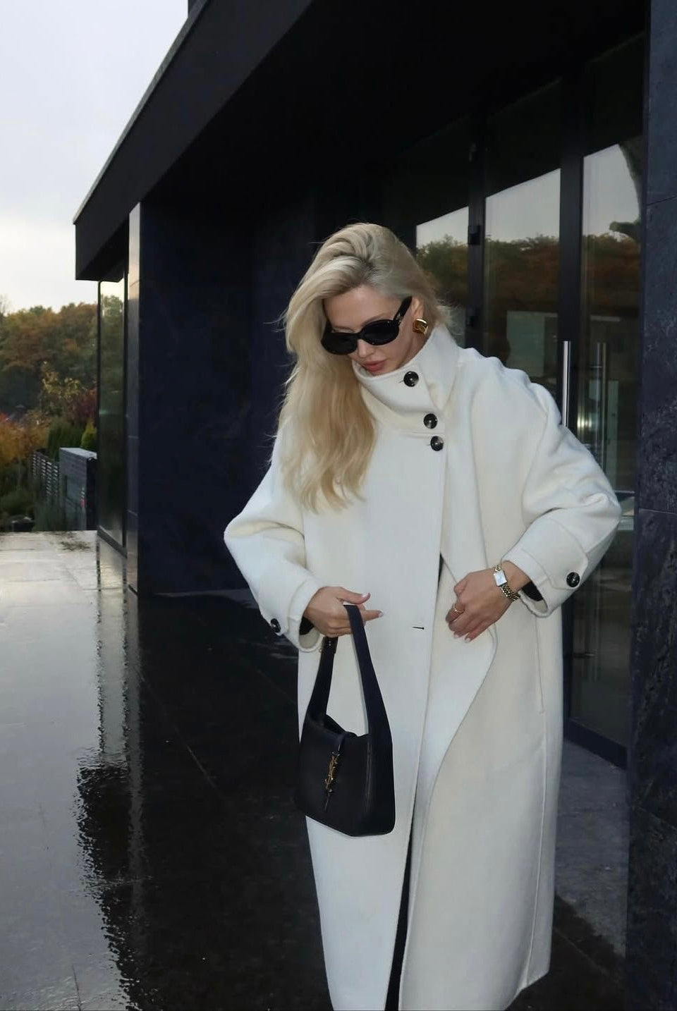 Elegant structured longline coat with high-neck design by Lumina Wear, featuring a sophisticated silhouette and tailored fit.