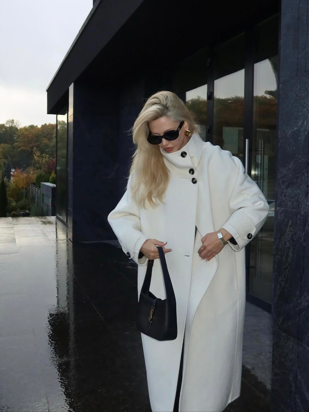Elegant structured longline coat with high-neck design by Lumina Wear, featuring a sophisticated silhouette and tailored fit.