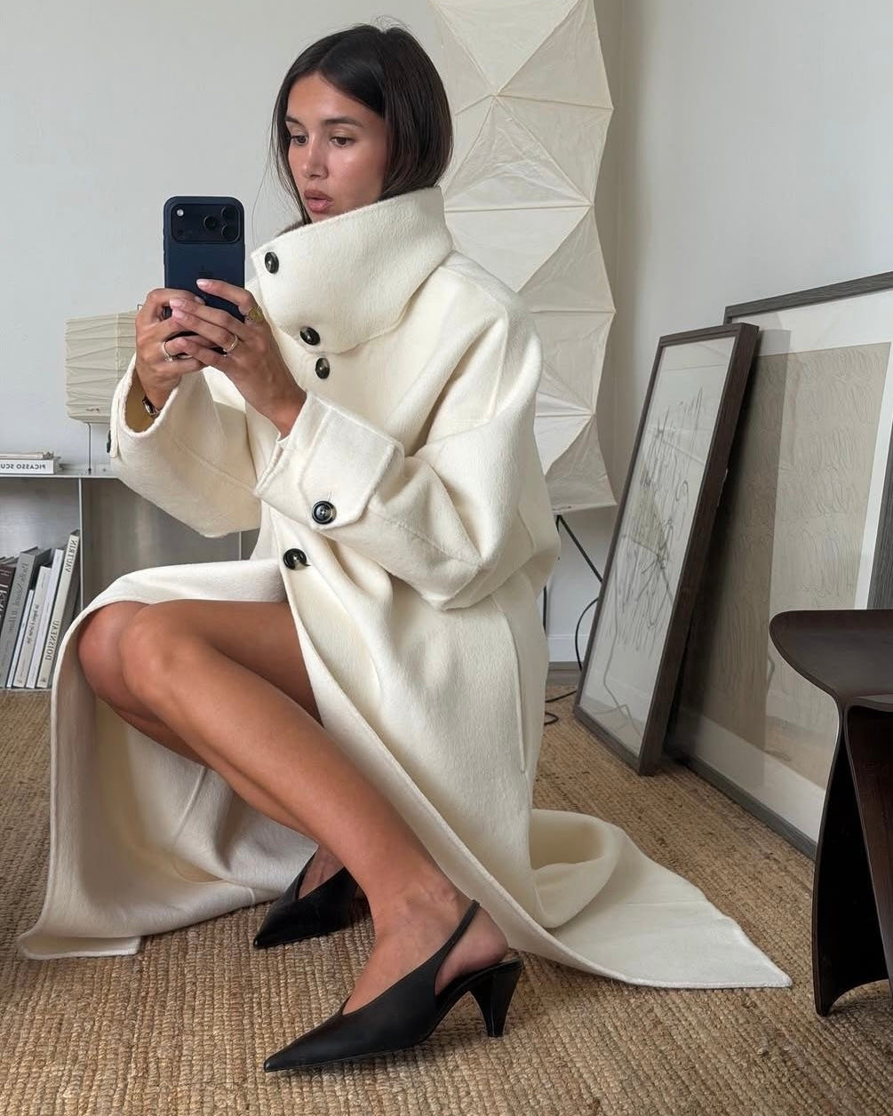 Elegant structured longline coat with high-neck design by Lumina Wear, featuring a tailored fit and sophisticated style.