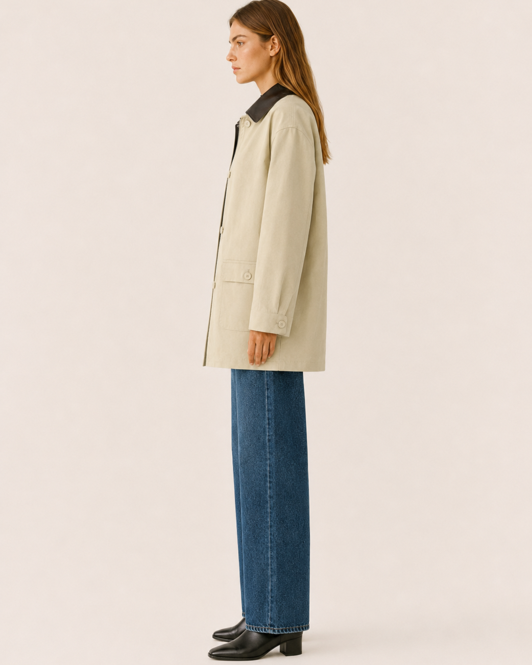 A beige barn jacket by Lumina Wear with a relaxed fit and contrasting collar, shown on a model.