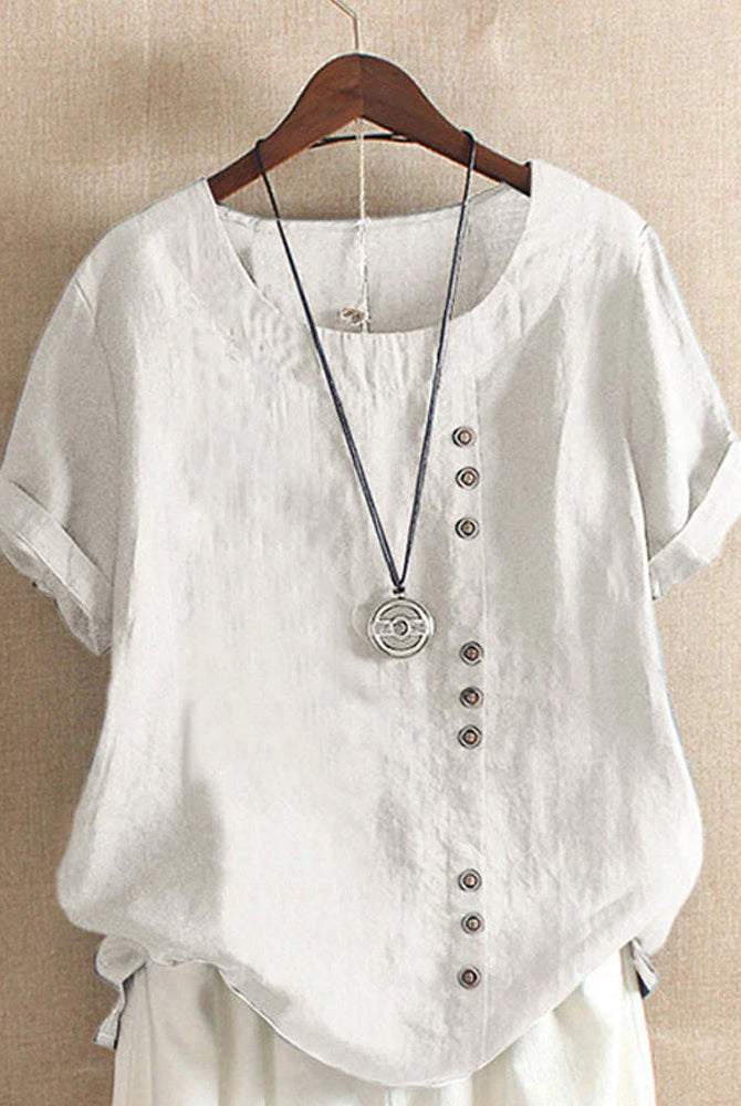 Light blue Lumina Wear Beatrice relaxed casual blouse with button detail, featuring a comfortable fit and stylish design.