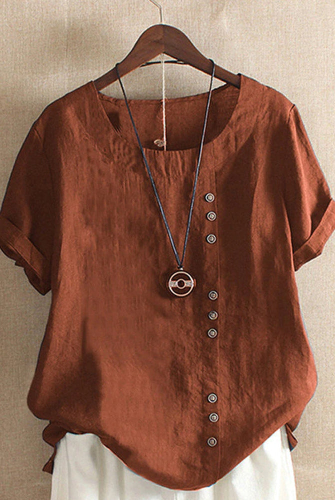 Light beige Beatrice casual blouse with button details from Lumina Wear, featuring a relaxed fit and stylish design.