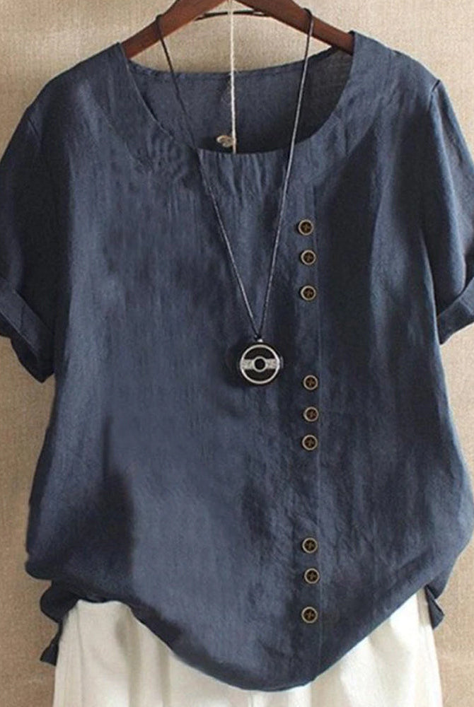 Light beige Lumina Wear Beatrice relaxed casual blouse with button details, featuring a comfortable fit and stylish design.