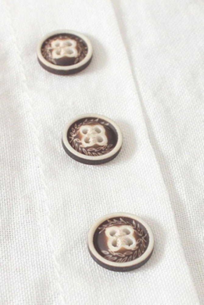 Light beige Lumina Wear Beatrice relaxed summer blouse with button detail, featuring a loose fit and breathable fabric.