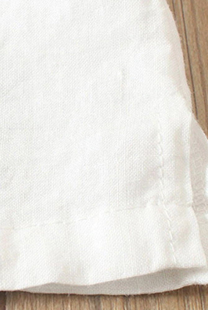 Light blue Beatrice relaxed summer blouse with button details from Lumina Wear, featuring a loose fit and casual style.