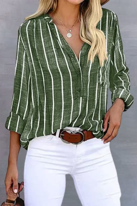 Light blue and white striped Lumina Wear Bella relaxed button blouse with a casual, timeless style, featuring a comfortable fit and button details.