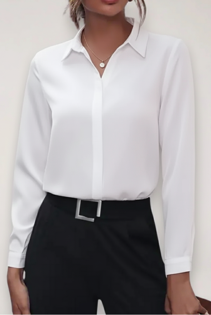 Elegant white tailored button-up women's blouse from Lumina Wear, featuring a classic fit and refined style.