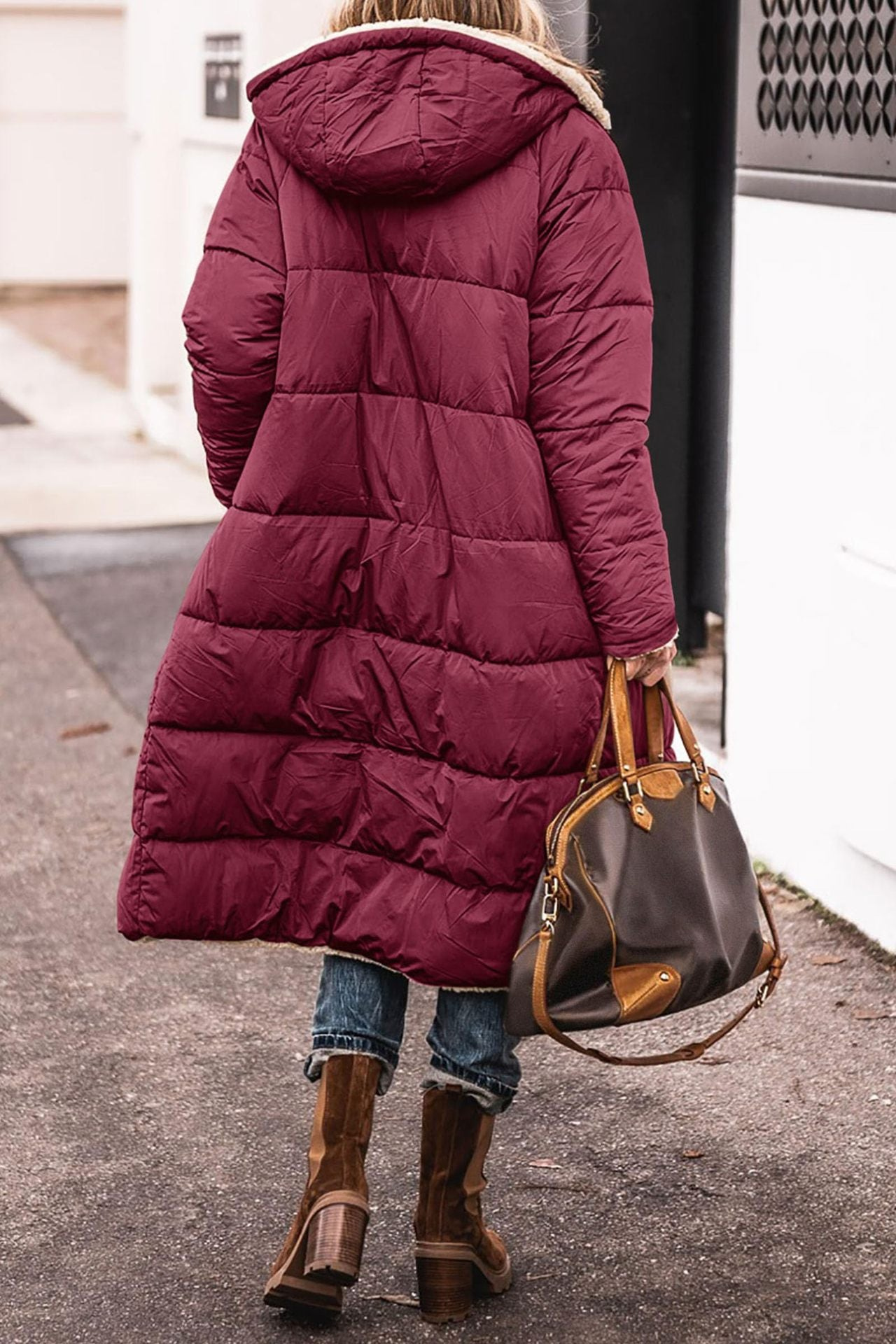 Elegant reversible long winter coat for women by Lumina Wear, showcasing cozy warmth and stylish design in a high-quality image.