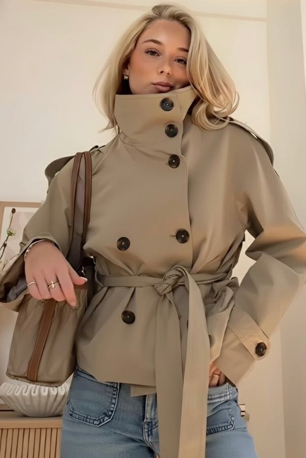 Light beige Cathryn Lumina women's short trench coat with belt and waist tie, structured design, suitable for stylish outerwear.
