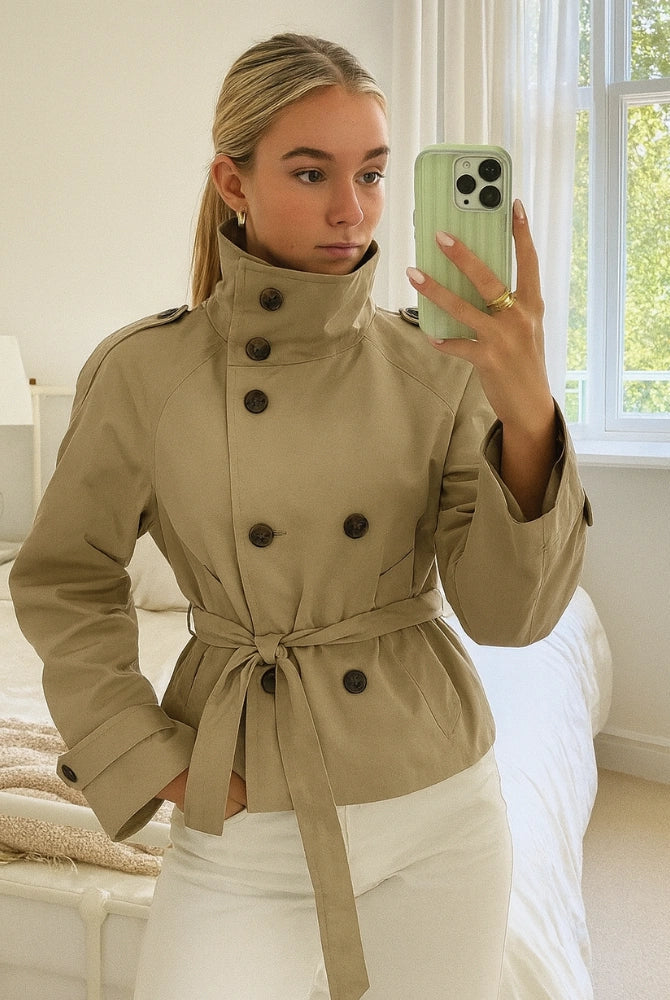 Lumina Wear Cathryn women's short trench coat with structured design, belt, and waist tie, perfect for stylish outerwear.