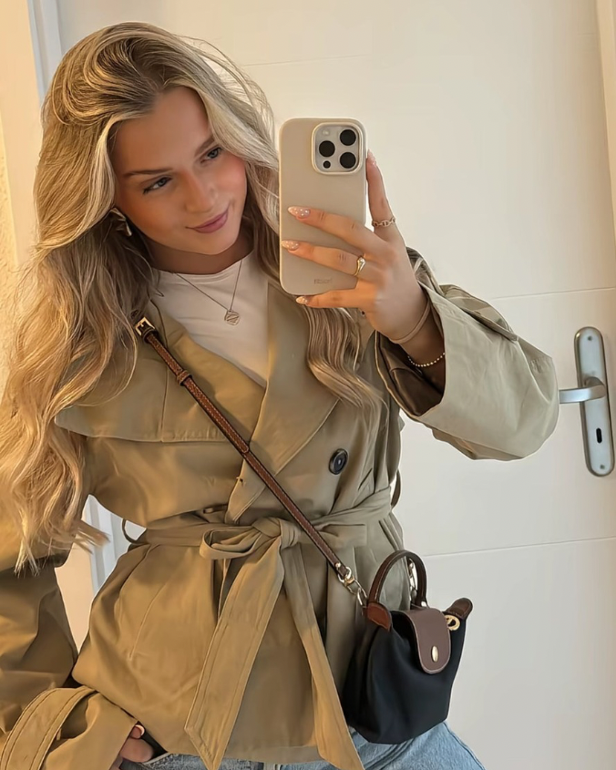 Lumina Wear Cathryn structured short trench coat with belt and waist tie, featuring a tailored, modern design in neutral fabric.