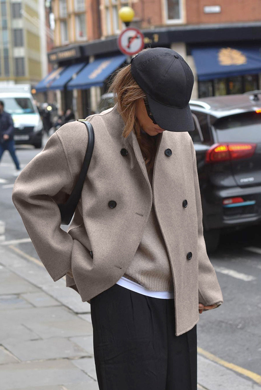 Black Charlene double-breasted peacoat with stand collar from Lumina Wear, showcasing tailored fit and classic style.