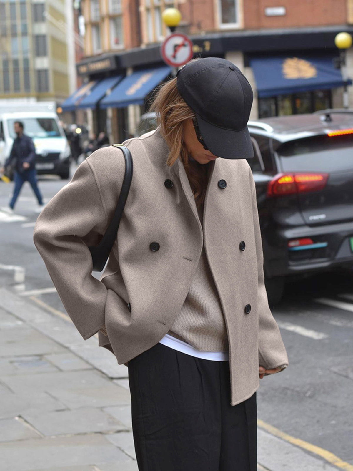 Black Charlene double-breasted peacoat with stand collar from Lumina Wear, showcasing tailored fit and classic style.