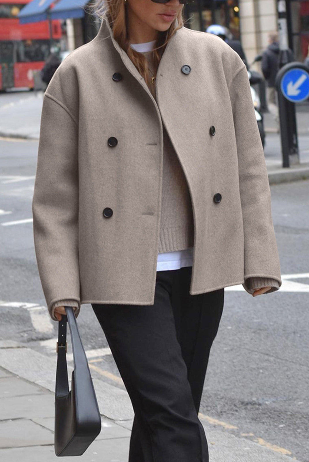 Charlen Lumina black double-breasted peacoat with stand collar, stylish outerwear for a sophisticated winter look.