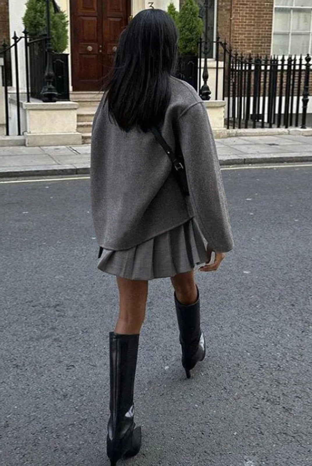 Black Charlene Lumina Wear double-breasted peacoat with stand collar, stylish and warm for cold weather.