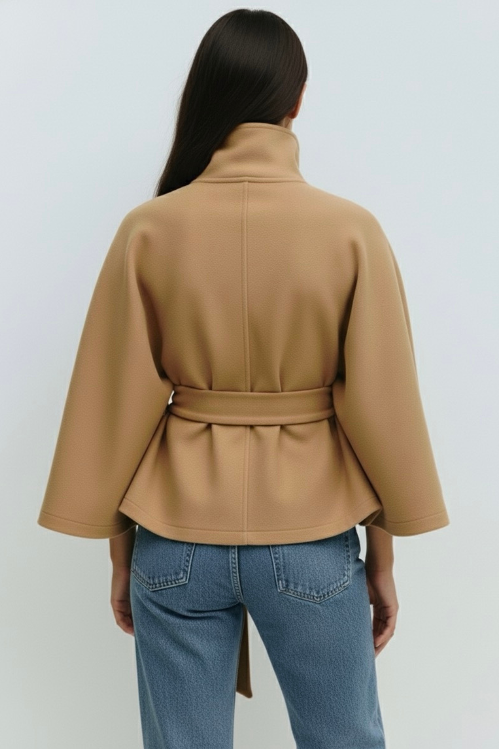 Lumina Wear Chloe elegant high-neck camel cape coat for women, showcasing a stylish, sophisticated jacket with a high collar and flowing design.