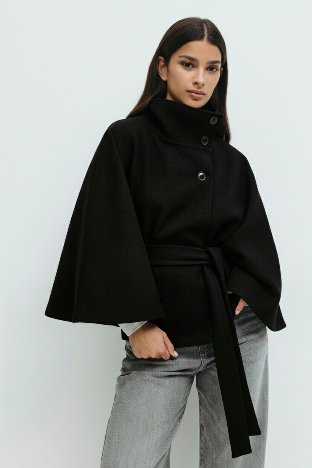 Elegant high-neck camel cape coat for women by Lumina Wear, showcasing a stylish, sophisticated jacket with a flowing silhouette.