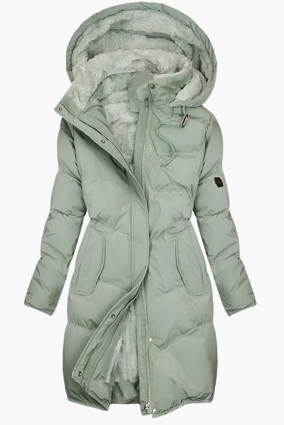 Lumina Wear Chloe elegant quilted hooded winter coat with tailored fit, showcasing its stylish design and cozy fabric.