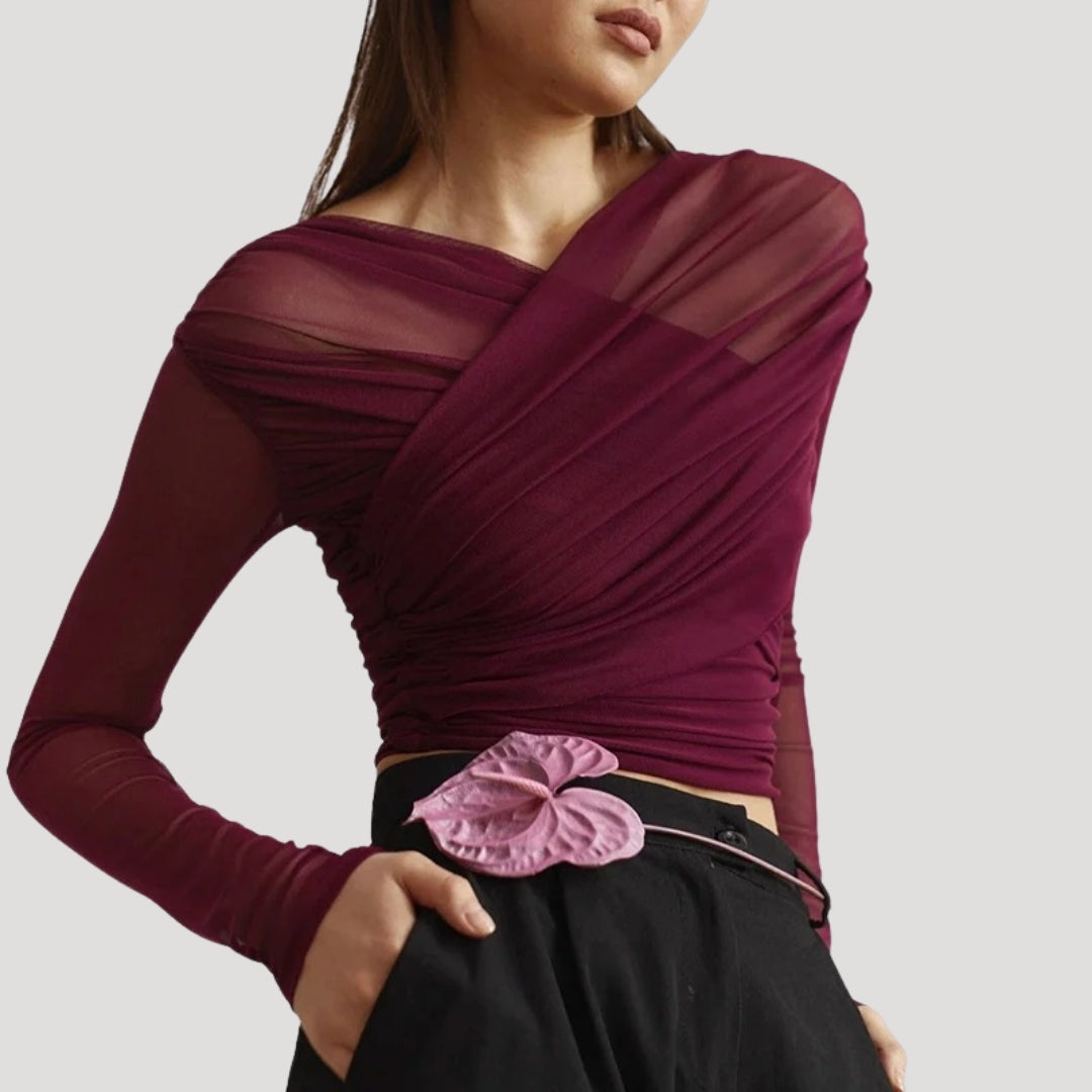 Elegant sheer wrap blouse by Lumina Wear featuring a flattering fit, perfect for stylish and sophisticated outfits.