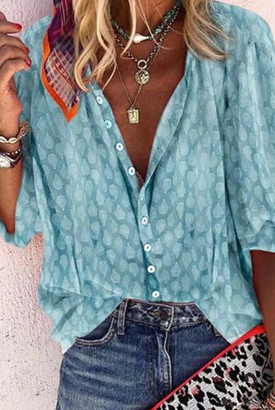 Brightly colored printed casual blouse with button front, women's top by Lumina Wear, featuring a vibrant and comfortable design.