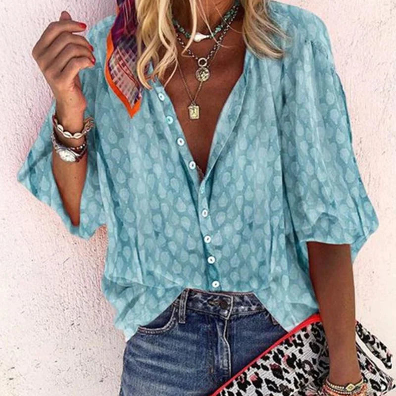 Brightly colored printed casual blouse with button front, women's top by Lumina Wear, featuring a vibrant and comfortable design.