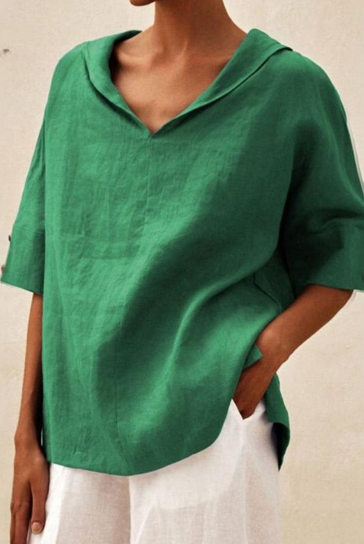 Lumina Wear Clara relaxed fit V-neck top, casual T-shirt with soft fabric and stylish design, worn with jeans.