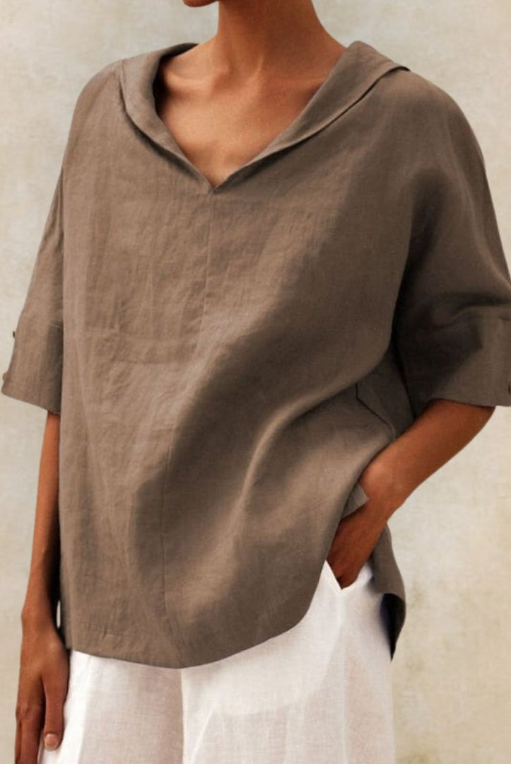 Lumina Wear Clara relaxed fit V-neck top in soft fabric, styled casually with sleeves and a comfortable fit.