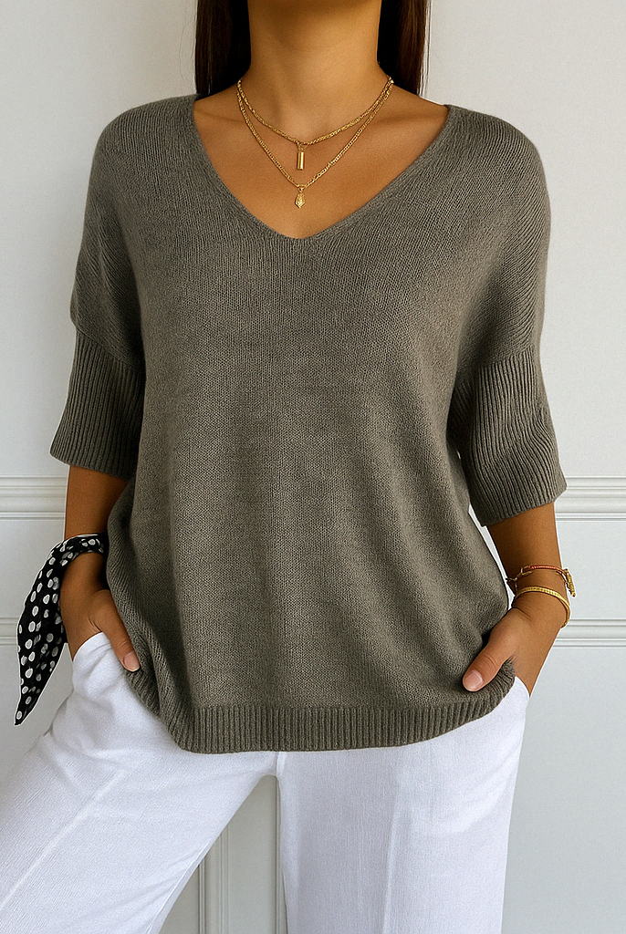 Lumina Wear Clara relaxed V-neck women's sweater with minimalist design, soft knit fabric and casual fit.