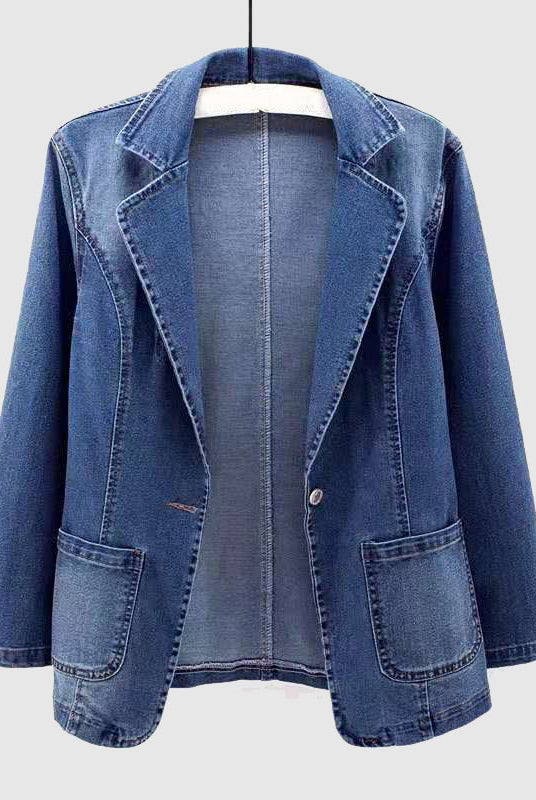 Light wash denim jacket by Lumina Wear featuring an elegant profile and classic jacket design.