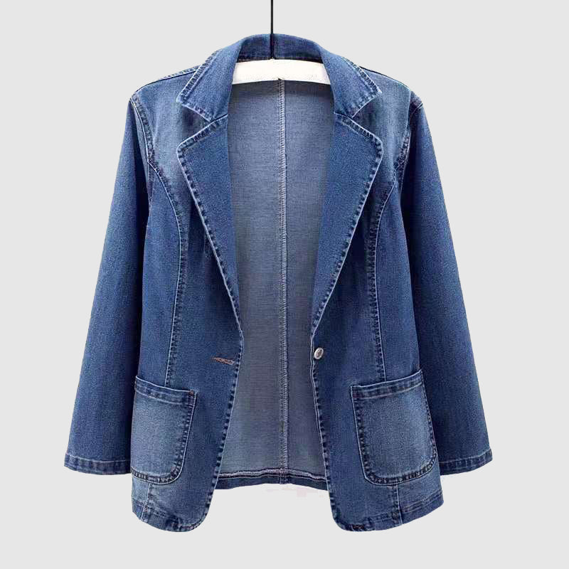 Light wash denim jacket by Lumina Wear featuring an elegant profile and classic jacket design.
