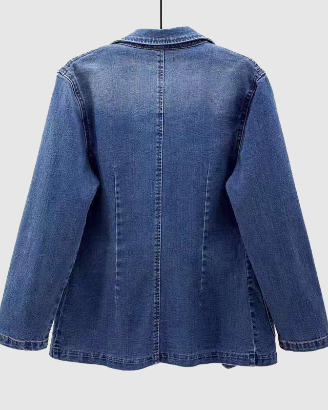 Light wash denim jacket by Lumina Wear featuring an elegant profile, styled on a model showcasing casual and chic appeal.