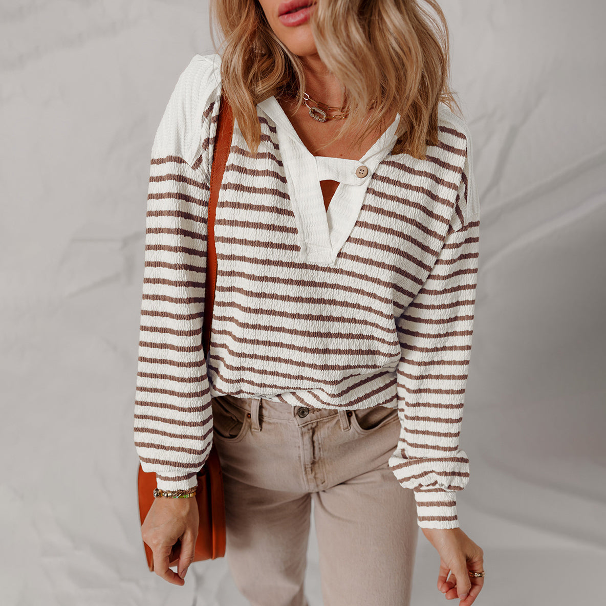 Lumina Wear Elise soft striped textured V-neck sweater with buttoned strap, cozy and stylish women's knit sweater.