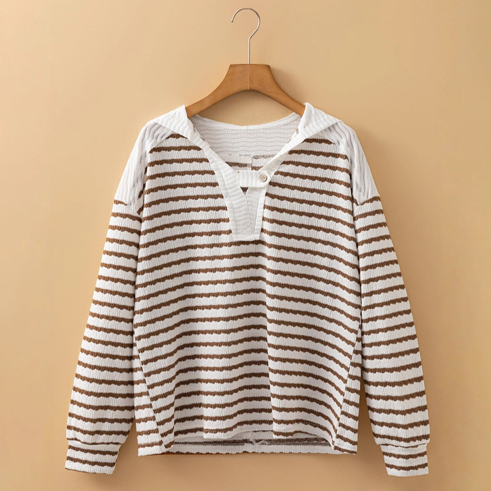 Lumina Wear Elise soft striped textured V-neck sweater with buttoned strap, showcasing cozy knit fabric and stylish design details.