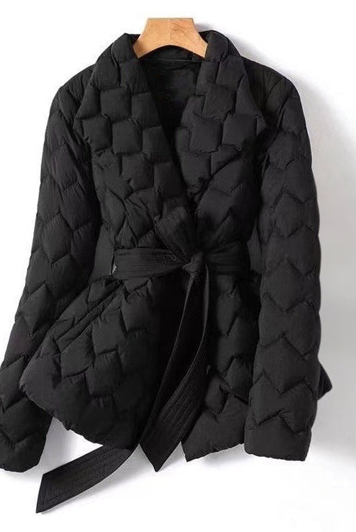 Lumina Wear Elise geometric down puffer jacket with belted waist, tailored fit, and quilted design for stylish winter warmth.