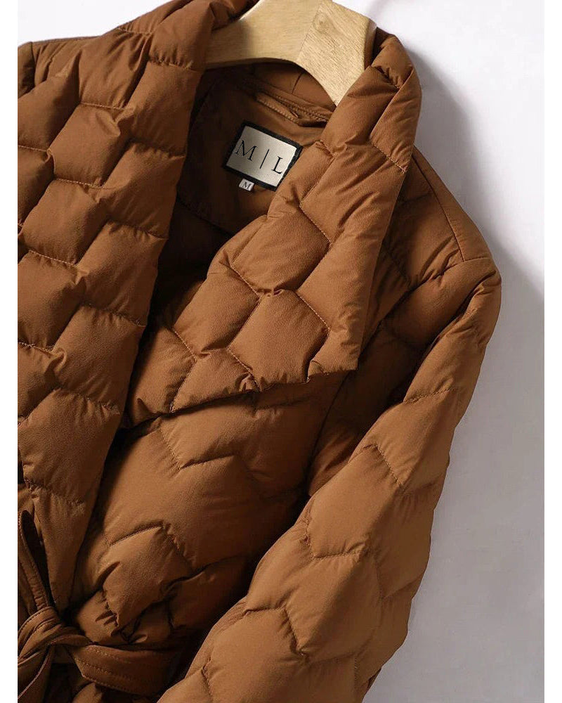 Lumina Wear Elise tailored geometric down puffer jacket with belted waist, featuring a stylish design and insulated for warmth.