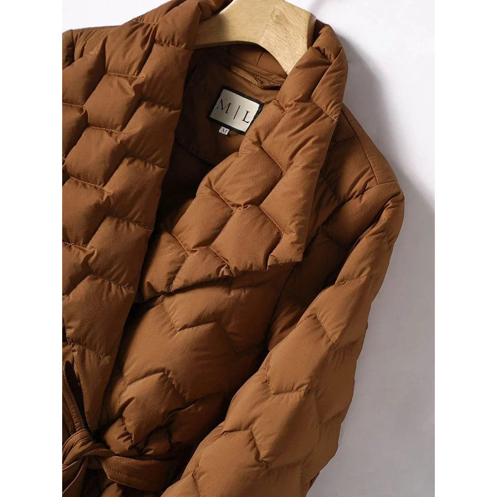 Lumina Wear Elise geometric down puffer jacket with belted waist, tailored fit, and quilted design, suitable for cold weather.