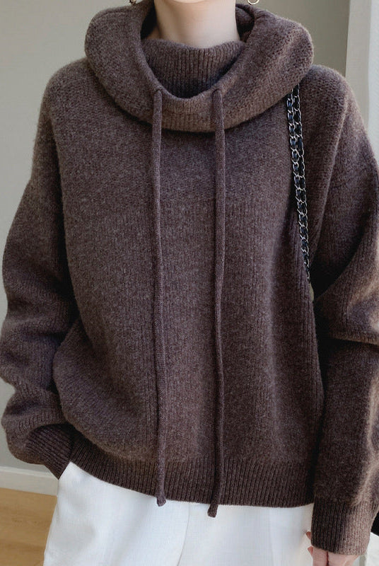 Lumina Wear Elise ultra-soft relaxed fit merino wool sweater with a tailored hood, shown in a cozy, comfortable fit.