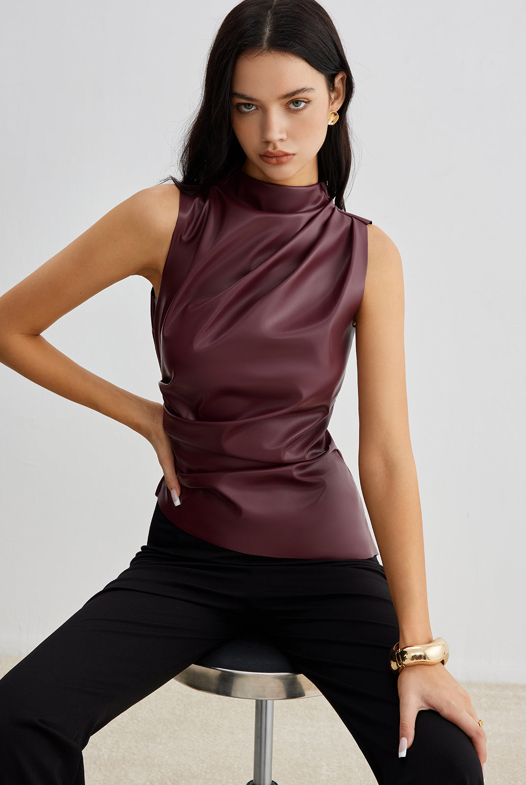 Lumina Wear Ella sleeveless high-neck tank top for women, featuring a chic design and fitted style, shown on a white background.