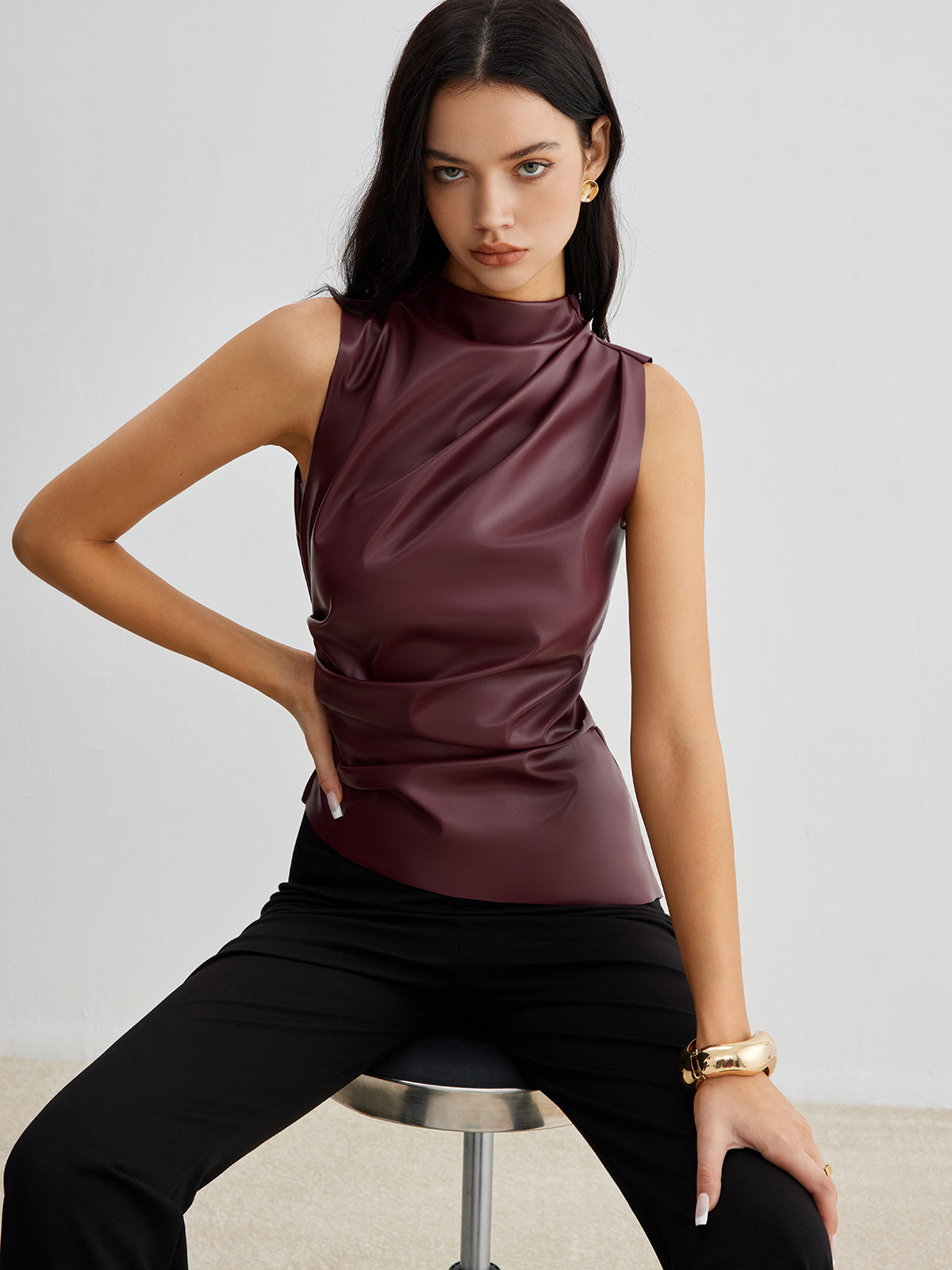 Lumina Wear Ella sleeveless high-neck tank top for women, featuring a chic design and fitted style, shown on a white background.