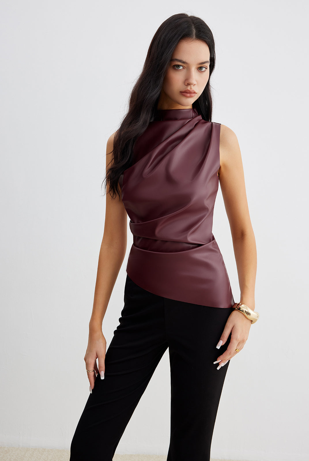 Ella Lumina Wear sleeveless high neck tank top for women, showcasing a chic, fitted design in a neutral color.