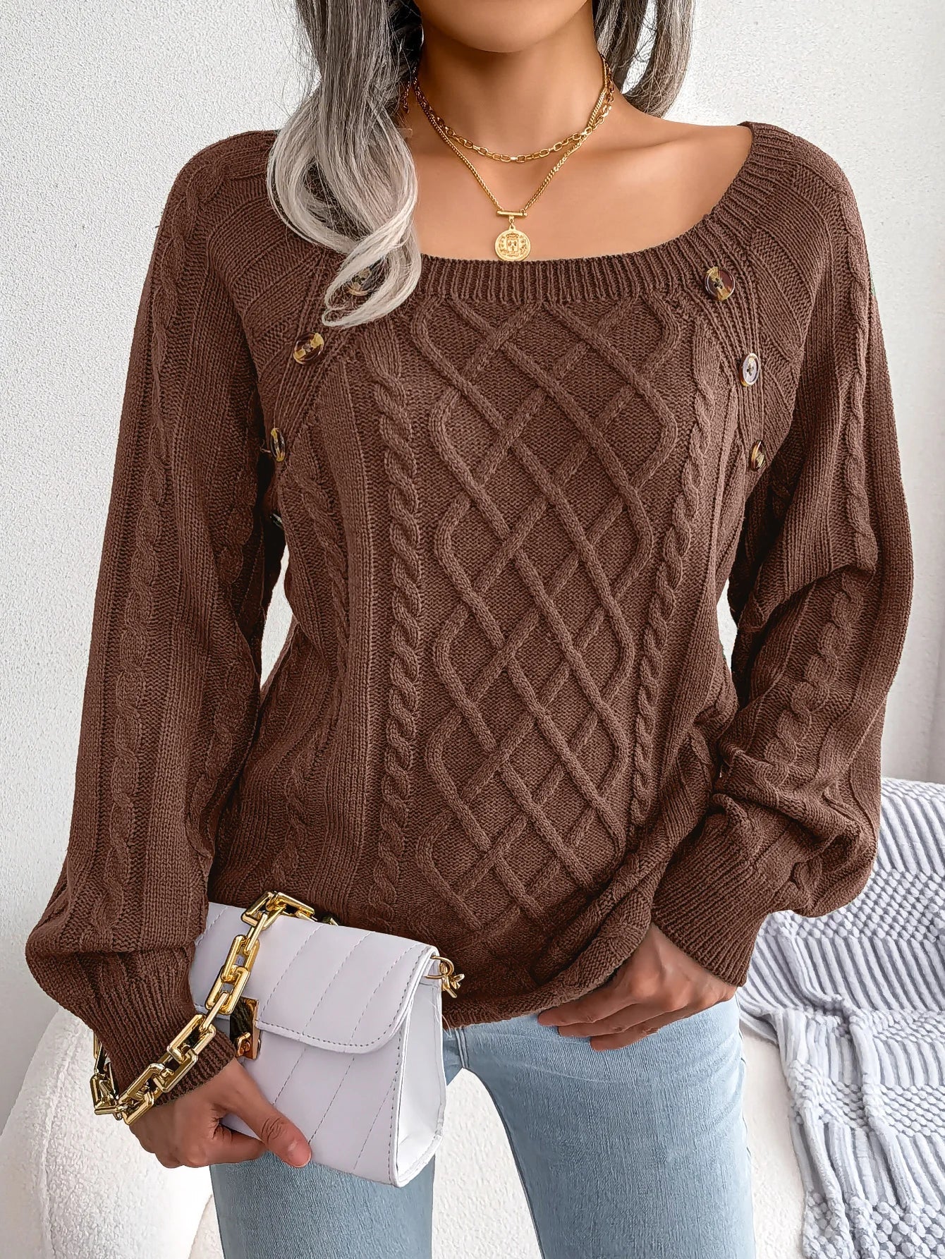 Lumina Wear Emilia women's cozy cable-knit relaxed fit sweater with button accents, soft and comfortable for casual wear.