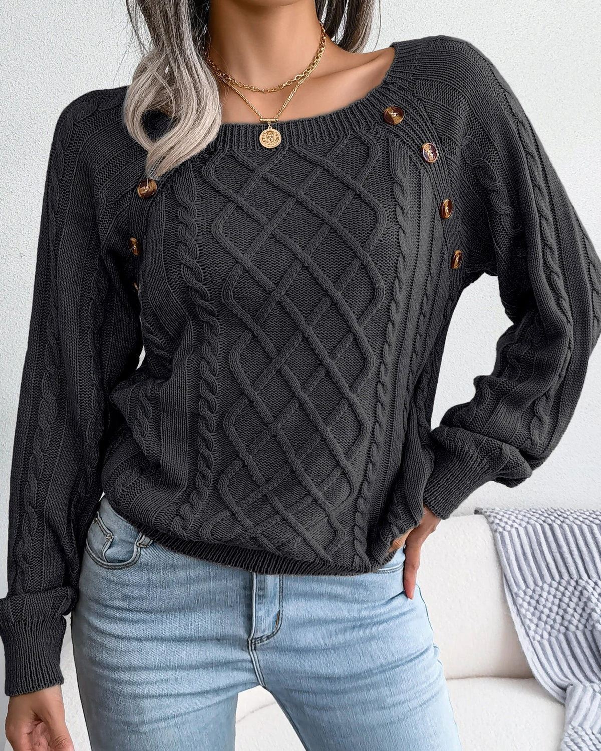 Lumina Wear Emilia women's cable-knit sweater with relaxed fit and button accents, cozy and stylish for casual wear.