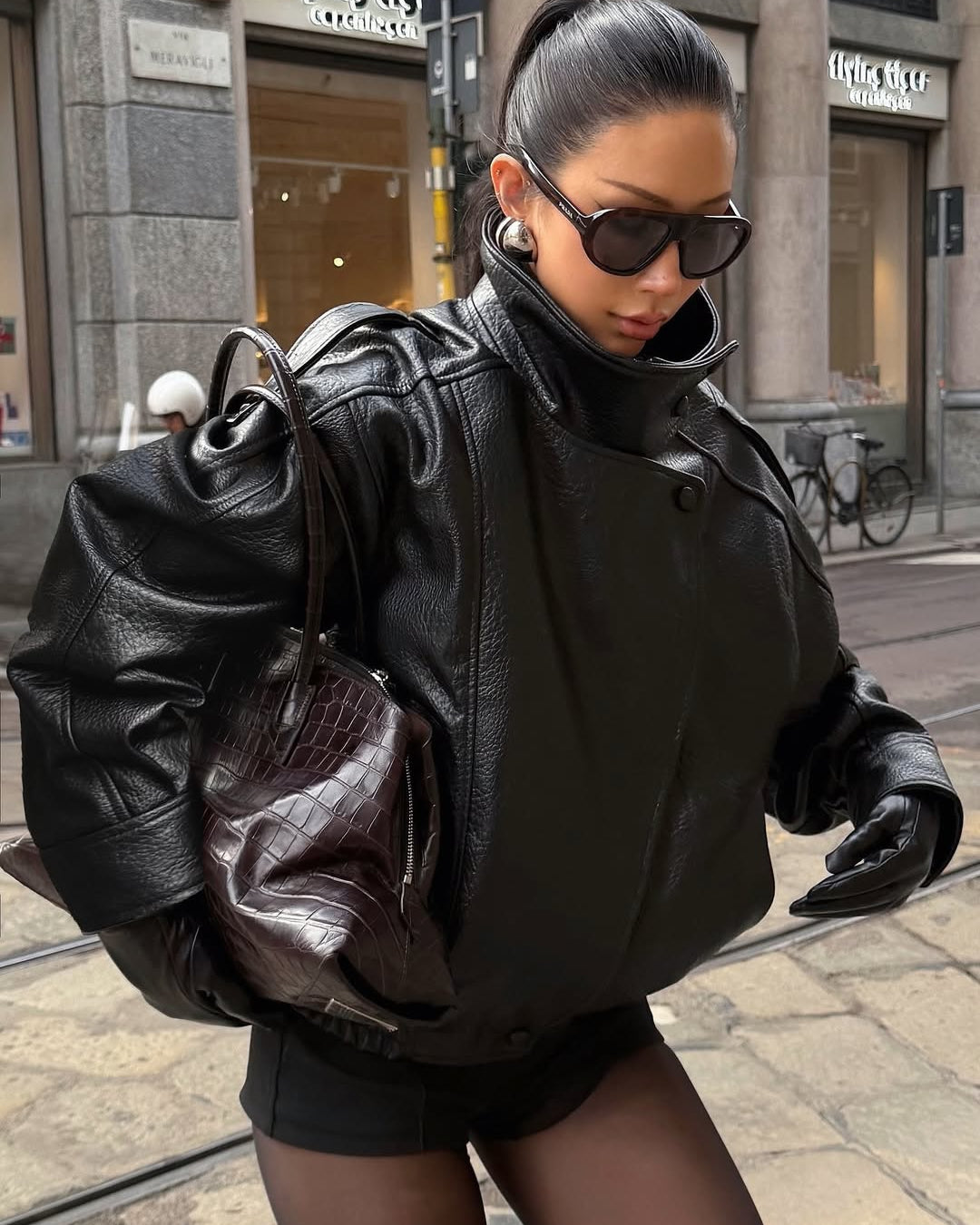 Lumina Wear Felicia oversized structured high-neck faux leather jacket with bold design and sleek black finish.