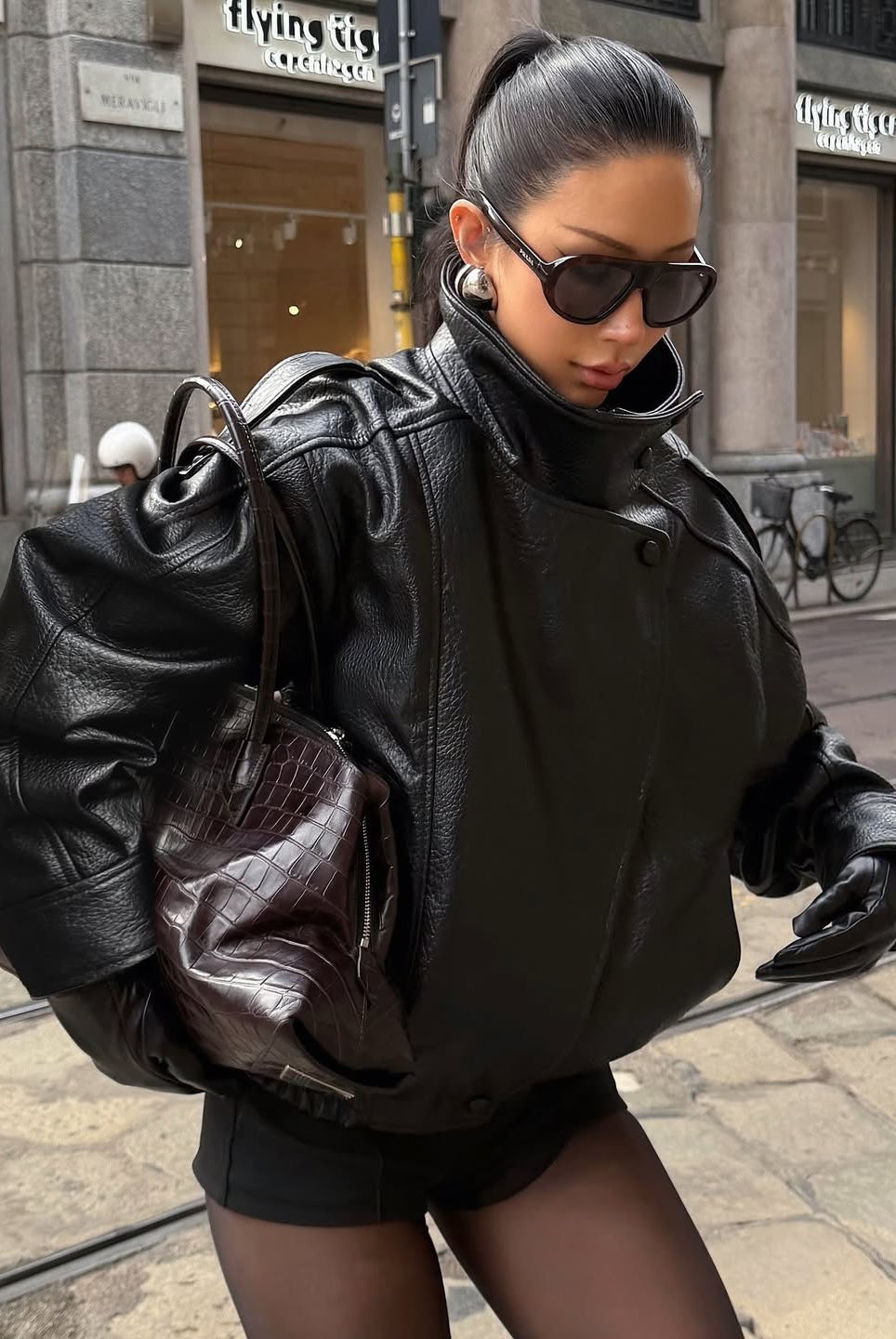 Lumina Wear Felicia oversized structured high-neck faux leather jacket for women, featuring a modern, bold design and sleek black finish.